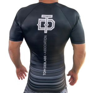 Tom DeBlass Assoc Shadow Grip Short Sleeve Rash Guards